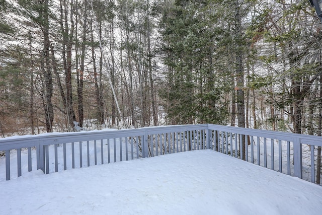 view of snow covered deck