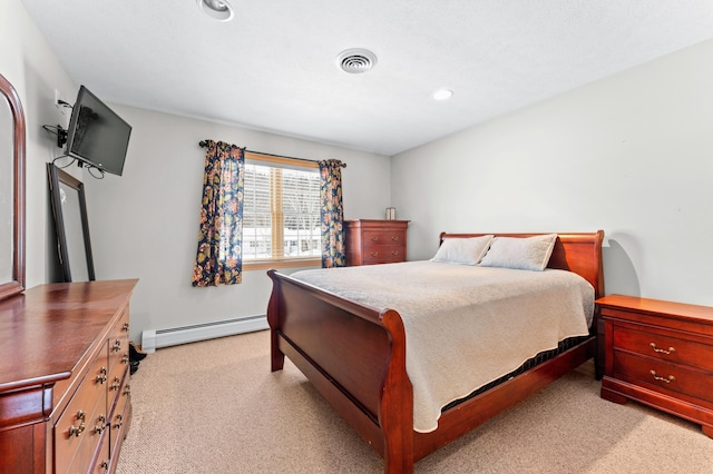 120 Bradbury Rd, Fort Kent, ME 04743 - carpeted bedroom with a baseboard heating unit