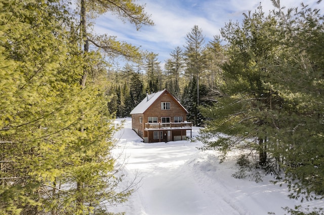 view of front of home featuring a wooden deck