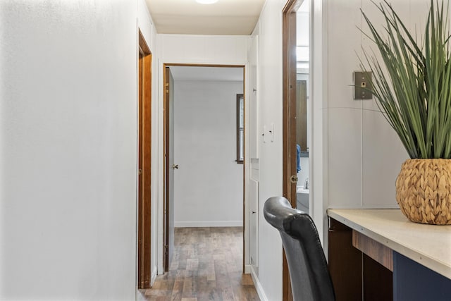 hallway featuring hardwood / wood-style floors