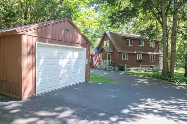 417 Middle Rd, Falmouth, ME 04105 - detached garage featuring fence and driveway