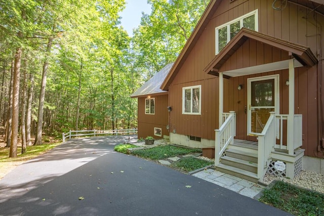 417 Middle Rd, Falmouth, ME 04105 - exterior space with fence and a wooded view