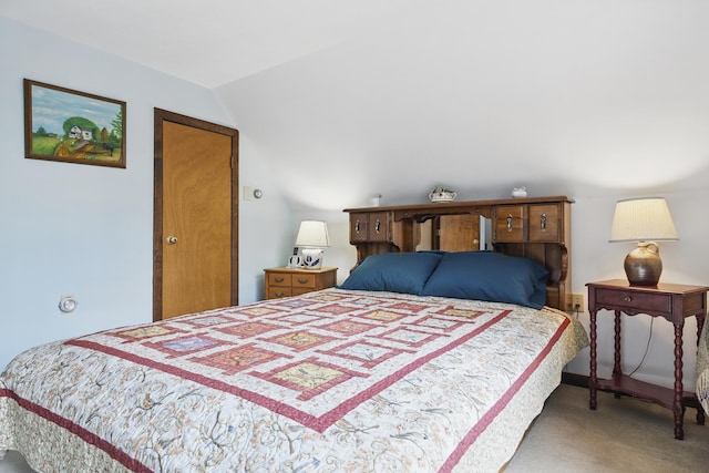 417 Middle Rd, Falmouth, ME 04105 - carpeted bedroom with vaulted ceiling