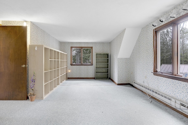 417 Middle Rd, Falmouth, ME 04105 - additional living space with a baseboard radiator, wallpapered walls, plenty of natural light, and carpet flooring