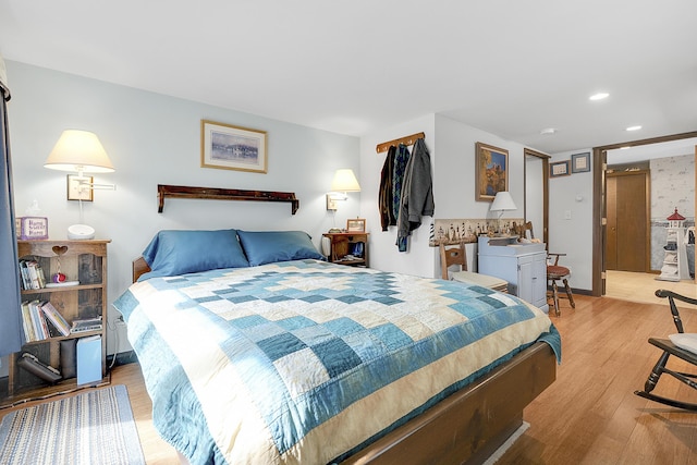 417 Middle Rd, Falmouth, ME 04105 - bedroom with light wood-type flooring and recessed lighting