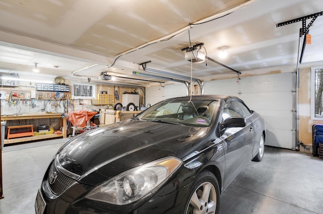 417 Middle Rd, Falmouth, ME 04105 - garage featuring a garage door opener