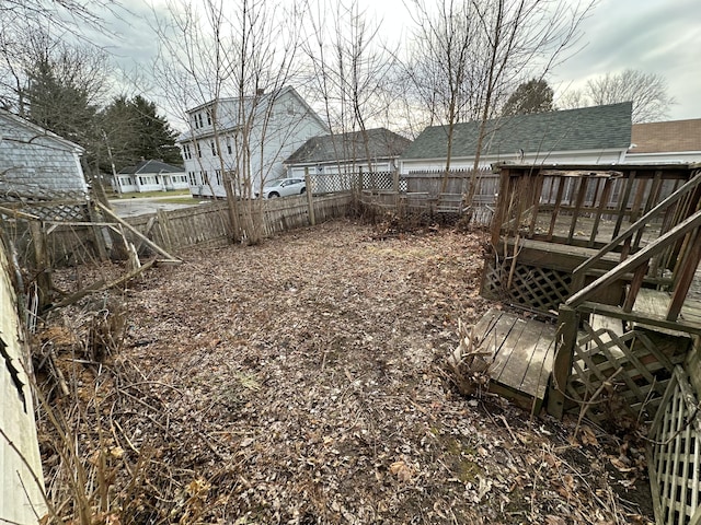 view of yard featuring a wooden deck