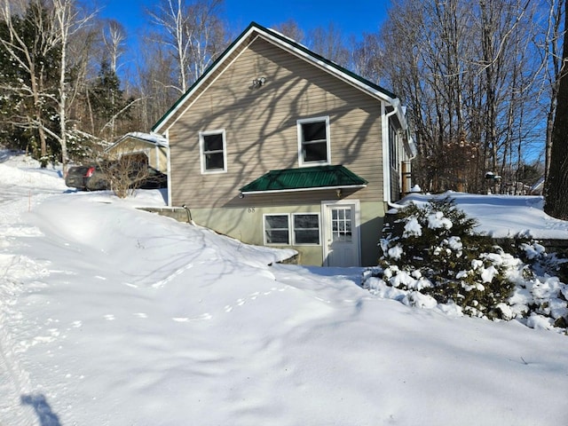 view of snow covered property