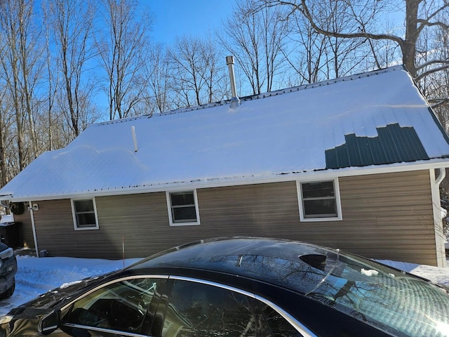 view of snow covered property