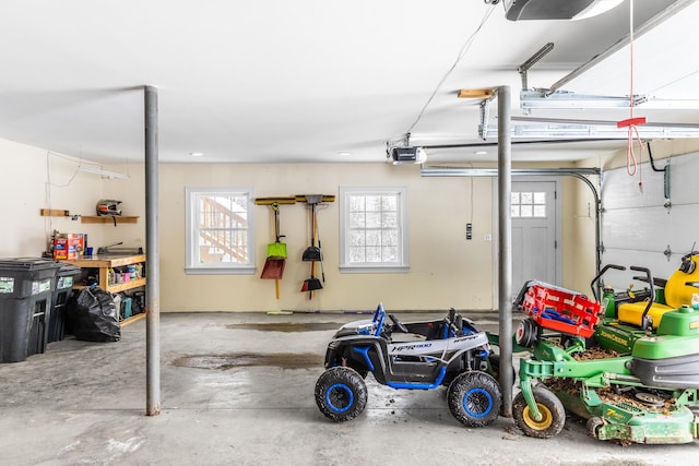 garage featuring a garage door opener