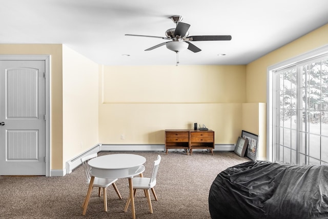 game room with carpet floors, ceiling fan, and baseboard heating