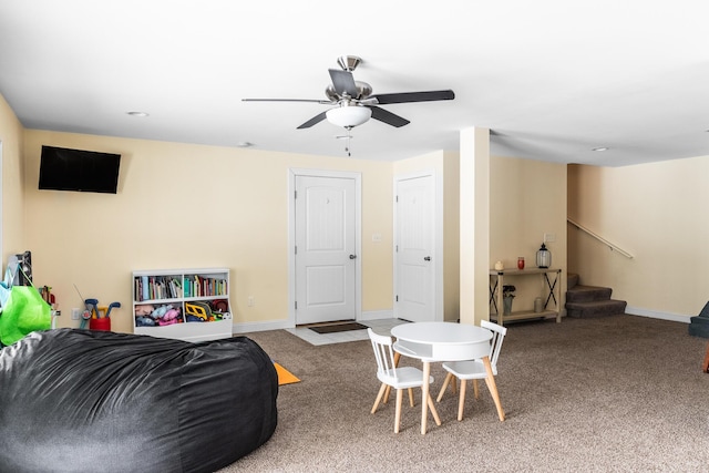 game room with ceiling fan and carpet floors