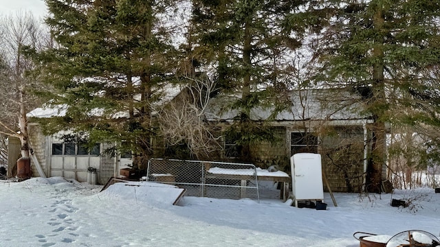 view of yard layered in snow