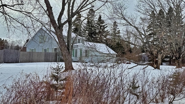 view of yard covered in snow