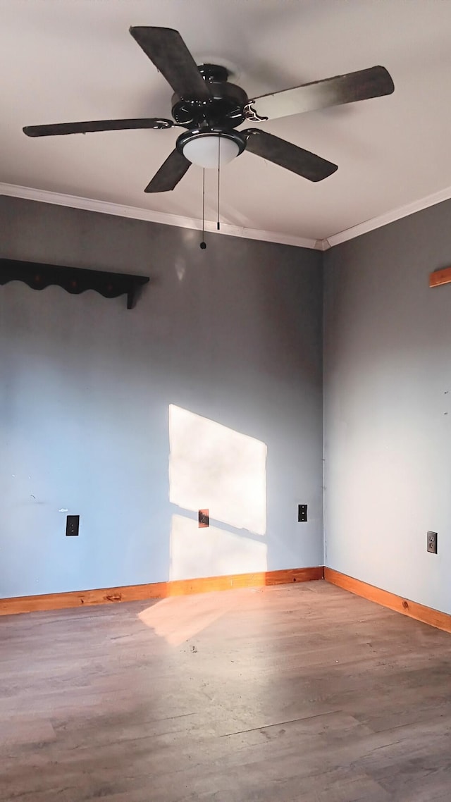 7 Hidden Meadow Ln, Dixfield, ME 04224 - unfurnished room with crown molding, wood finished floors, ceiling fan, and baseboards