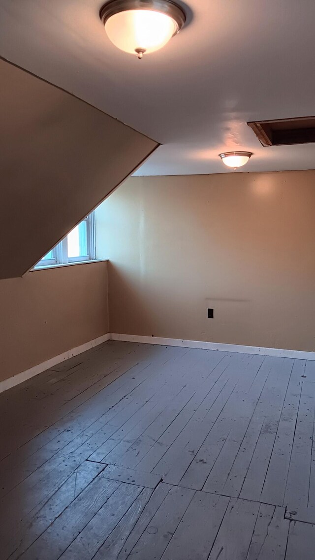 7 Hidden Meadow Ln, Dixfield, ME 04224 - bonus room with baseboards and hardwood / wood-style floors