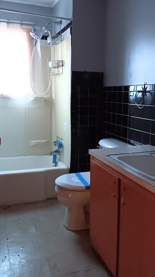 7 Hidden Meadow Ln, Dixfield, ME 04224 - full bath featuring bathtub / shower combination, vanity, tile walls, and toilet
