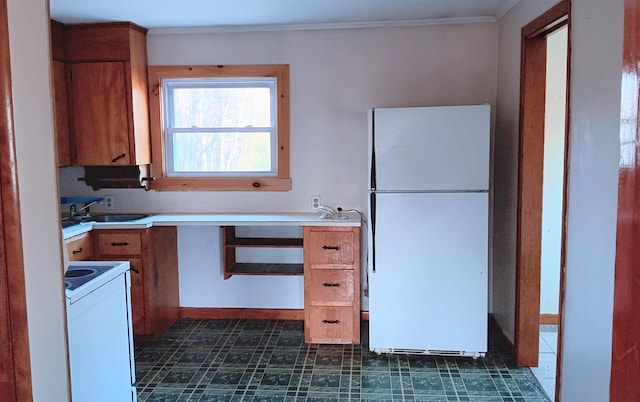 7 Hidden Meadow Ln, Dixfield, ME 04224 - kitchen featuring white appliances, light countertops, brown cabinets, a sink, and dark floors