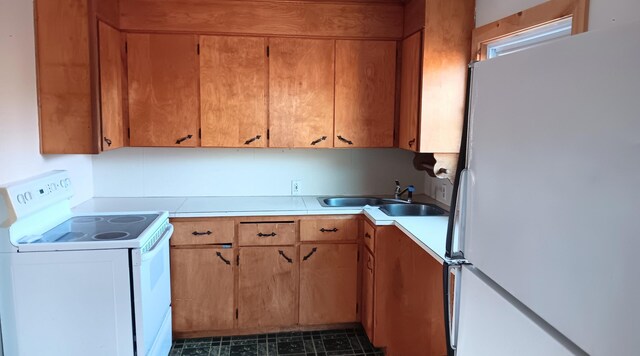 7 Hidden Meadow Ln, Dixfield, ME 04224 - kitchen featuring white appliances, light countertops, a sink, and brown cabinets