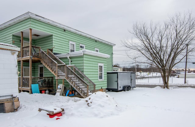 view of snow covered property