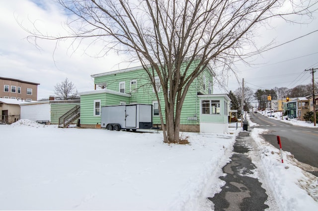 view of snow covered property