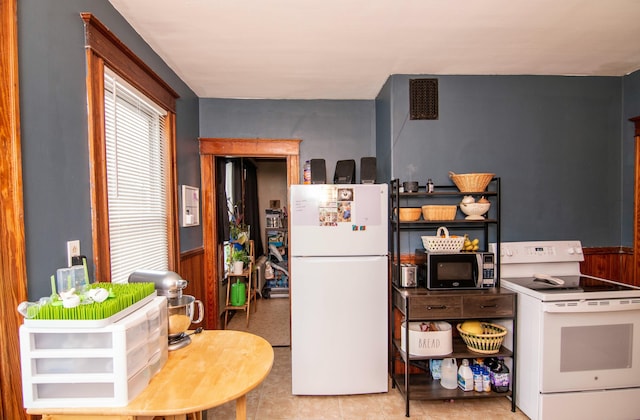 kitchen featuring white appliances