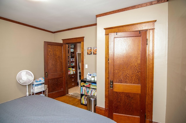 bedroom featuring crown molding