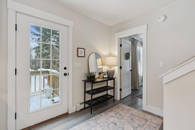 entryway with dark wood-type flooring