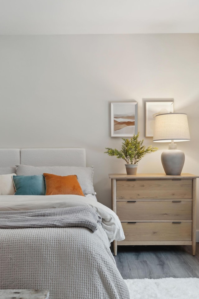 bedroom featuring dark hardwood / wood-style floors