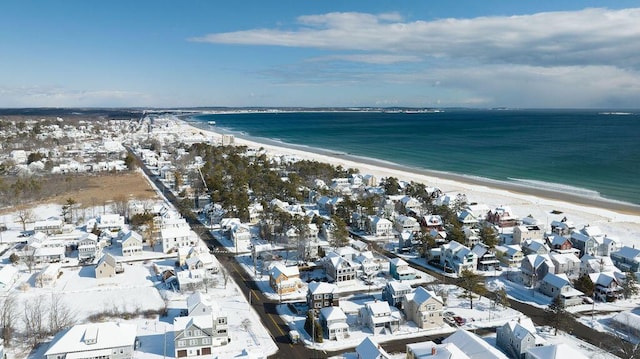 birds eye view of property featuring a water view and a view of the beach