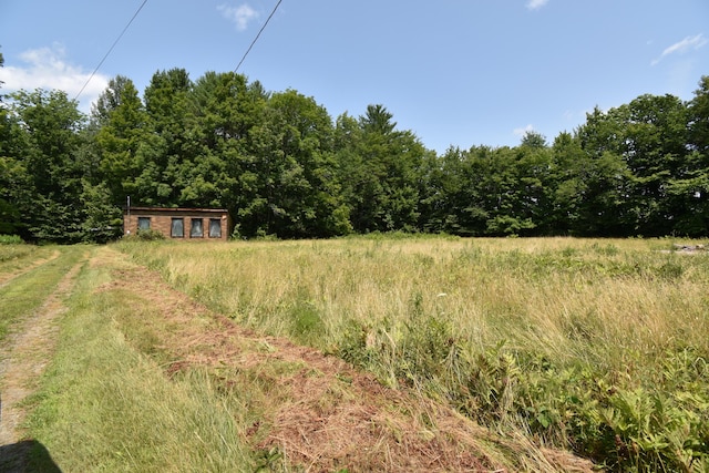 exterior space with a rural view