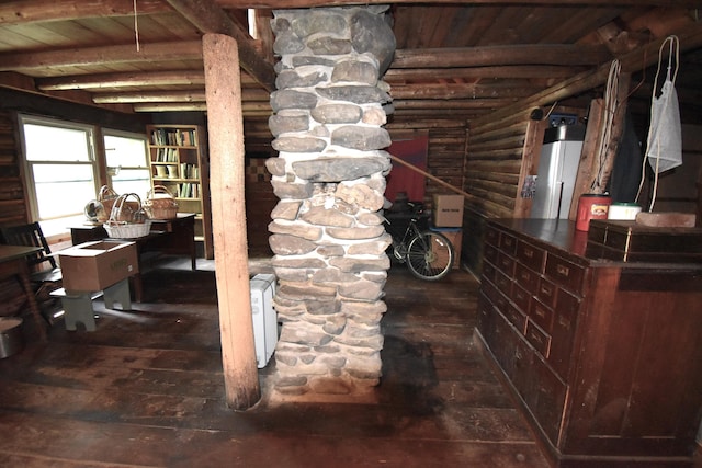 interior space with dark wood-type flooring and wooden ceiling