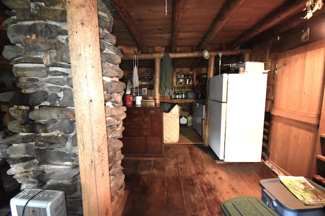 kitchen featuring dark hardwood / wood-style flooring, beam ceiling, wooden ceiling, and white refrigerator