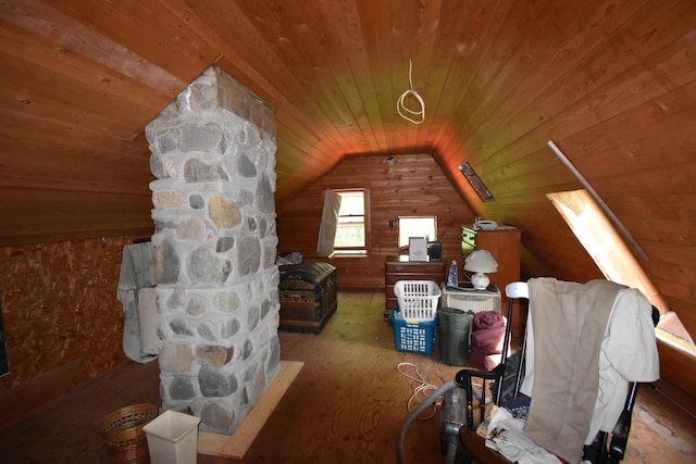 bonus room featuring wood ceiling and lofted ceiling with skylight