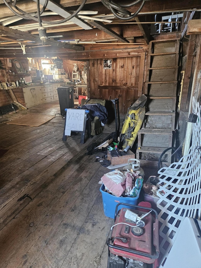 basement with wood-type flooring