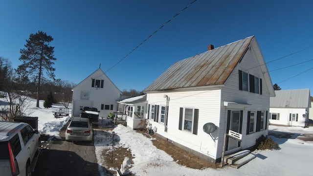 view of snow covered property