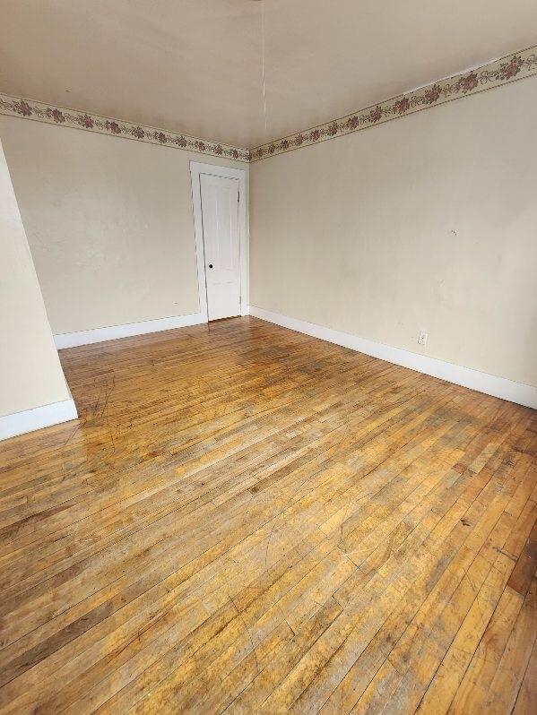 52 Hampshire St, Auburn, ME 04210 - unfurnished room with light wood-type flooring