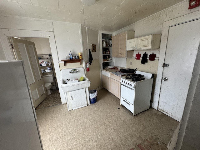 52 Hampshire St, Auburn, ME 04210 - kitchen featuring white range with gas cooktop