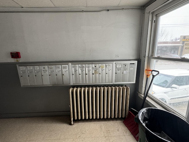 52 Hampshire St, Auburn, ME 04210 - interior space featuring radiator heating unit and a paneled ceiling