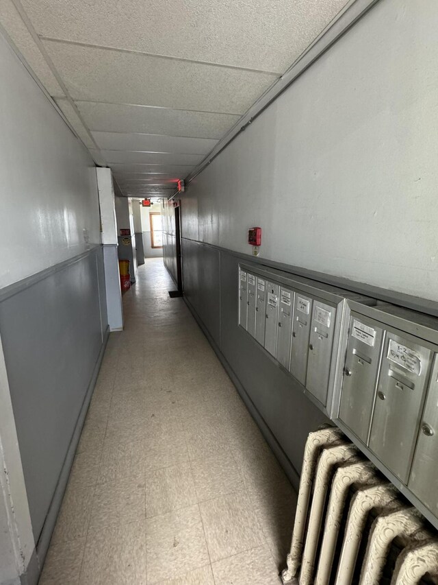 52 Hampshire St, Auburn, ME 04210 - hall featuring a paneled ceiling and mail boxes