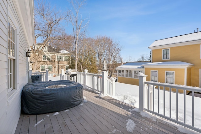 snow covered deck with grilling area