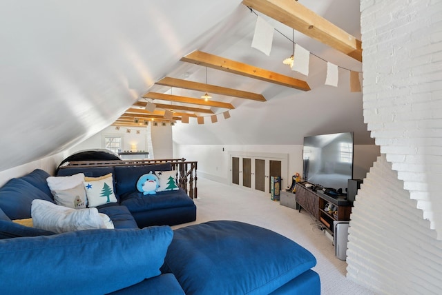 carpeted living room featuring lofted ceiling with beams