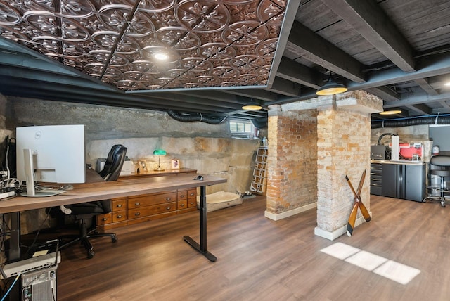 basement with wood-type flooring