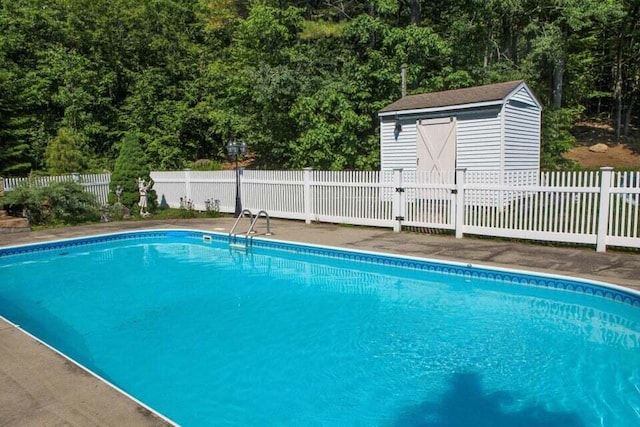 view of pool featuring a storage unit