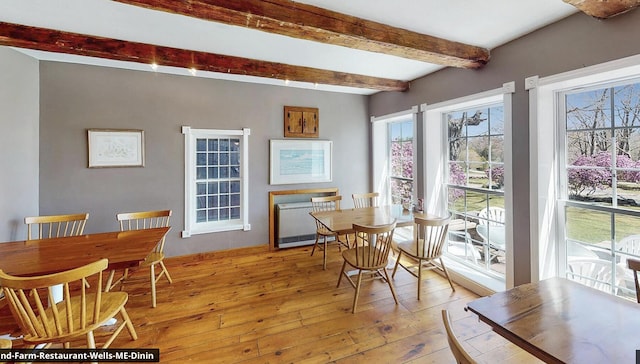 557 Coles Hill Rd, Wells, ME 04090 - dining area featuring beam ceiling and light hardwood / wood-style floors