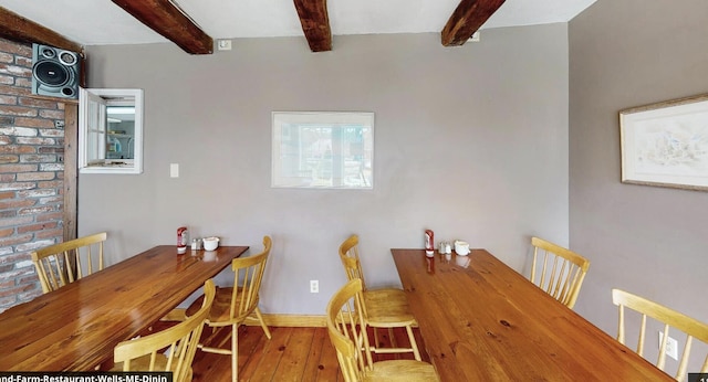 557 Coles Hill Rd, Wells, ME 04090 - dining space featuring hardwood / wood-style flooring and beamed ceiling