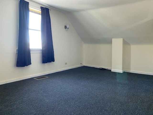 bonus room with lofted ceiling