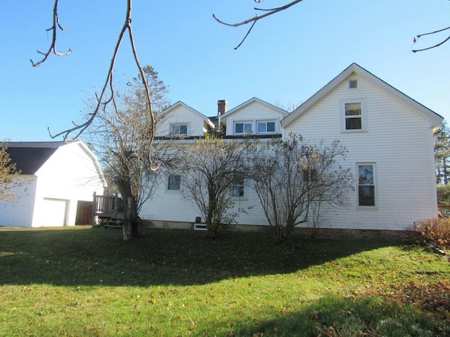 view of side of home featuring a lawn