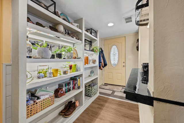 mudroom featuring visible vents, wood finished floors, and recessed lighting