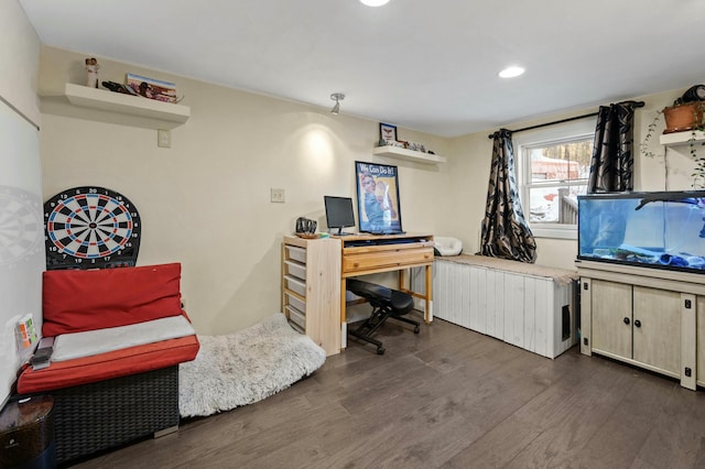 office area with recessed lighting, dark wood finished floors, and radiator